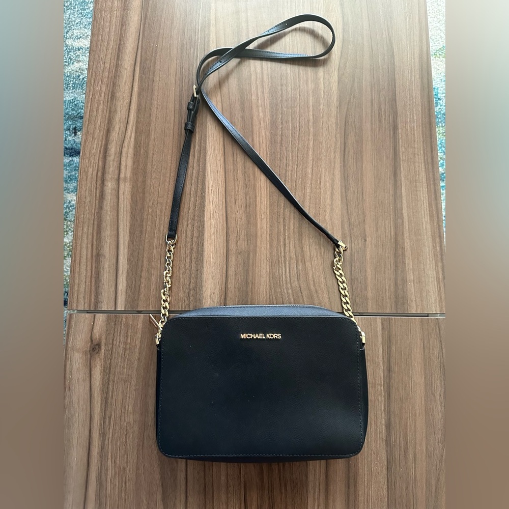 Michael kors black cross body purse with gold accents